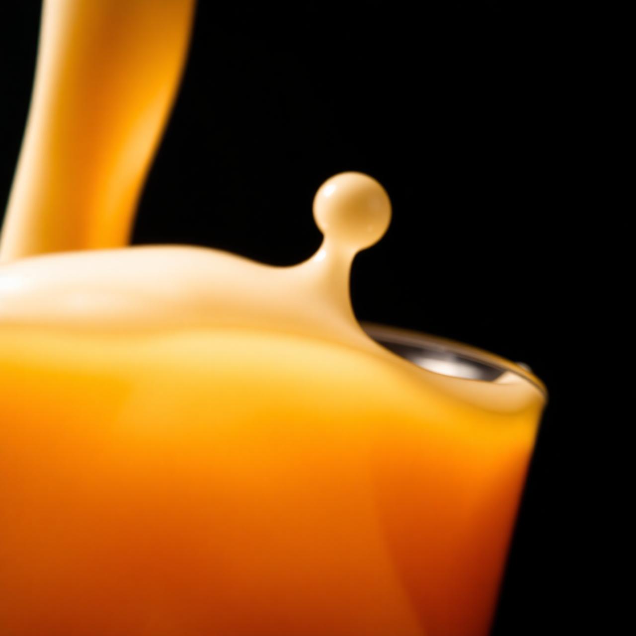 Cream swirling into milk tea